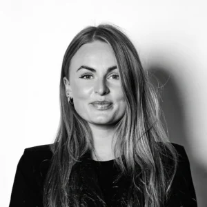 Corporate headshot of a TellusRem team member in professional business attire