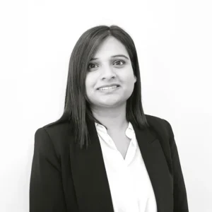 Corporate headshot of a TellusRem employee wearing professional business attire