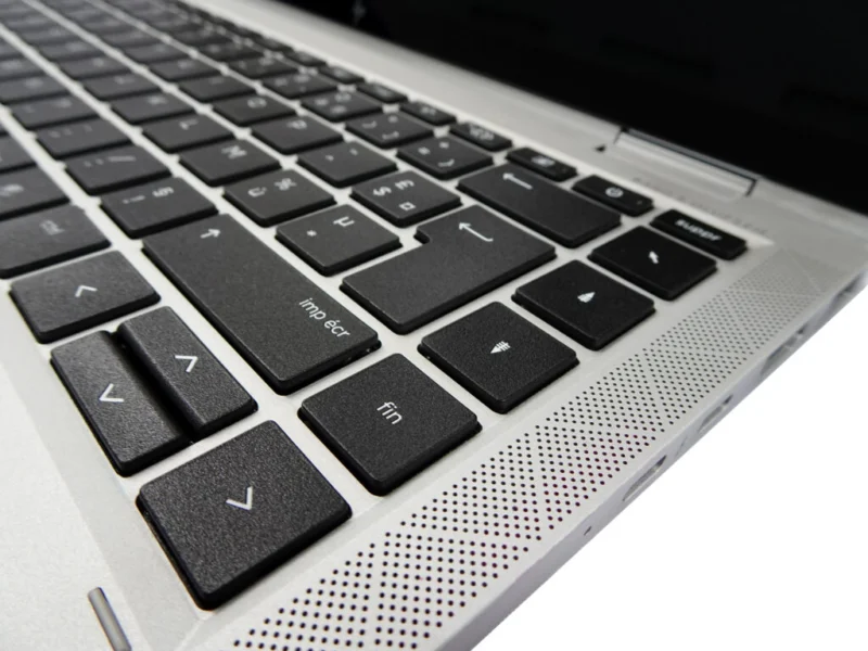 Close up of a laptop keyboard showing keys and surface used for refurbishment and keyboard reprinting services