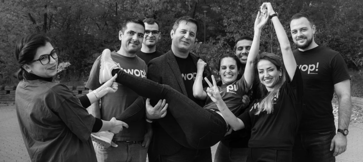 TellusRem team members posing together representing company culture and expertise in IT refurbishment and keyboard services